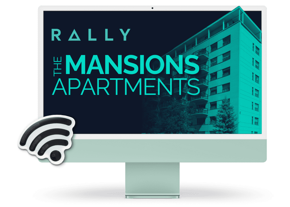 An iMac computer with a picture of a building the Rally logo and a Wi-Fi symbol appear prominently and the building name The Mansions Apartments