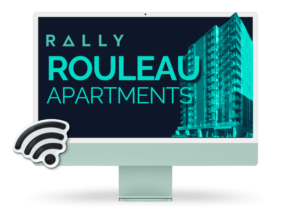 An iMac computer with a picture of a building the Rally logo and a Wi-Fi symbol appear prominently and the building name Rouleau Apartments